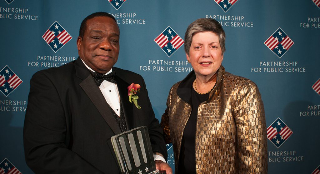 2010 Federal Employee of the Year, Pius Bannis, and former Secretary of Homeland Security, Janet Napolitano